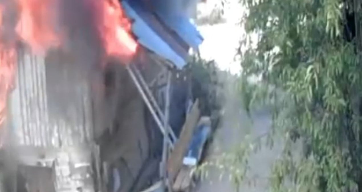 insanlik olmemis anne ve engelli oglunu kurtarmak icin yanan eve girdi Gg9qRrv4